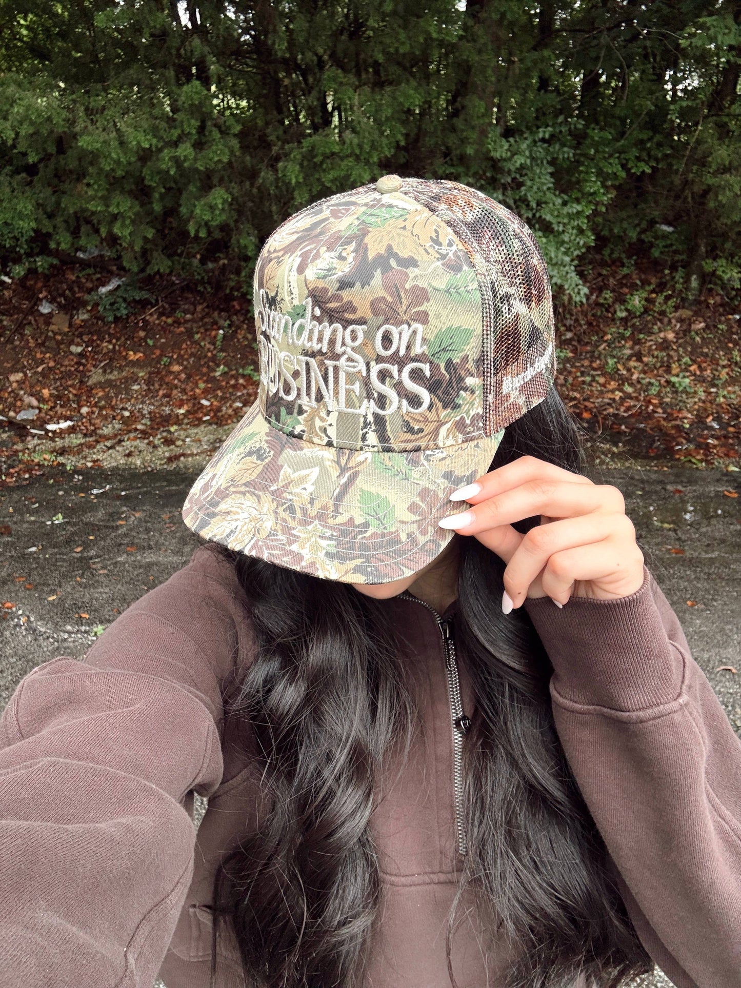 Standing on Business Trucker Hat