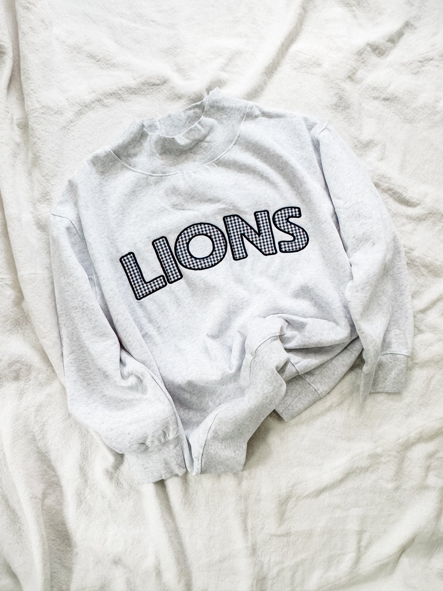 LIONS Gingham Mockneck