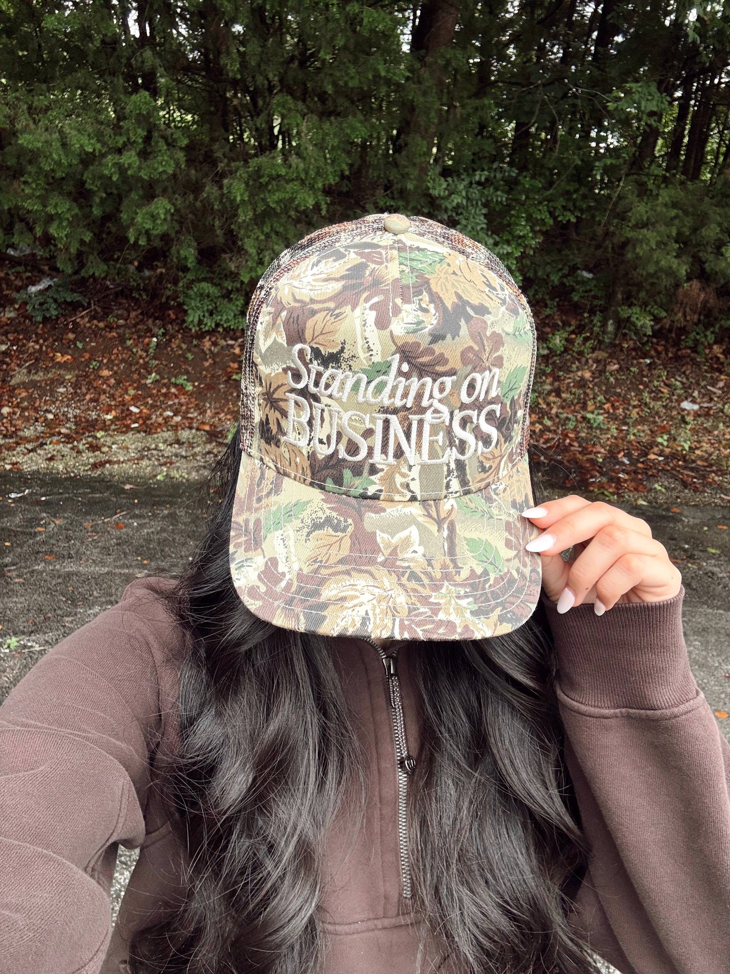 Standing on Business Trucker Hat